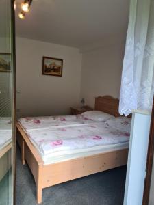 Postel nebo postele na pokoji v ubytování Gostilna Batišt