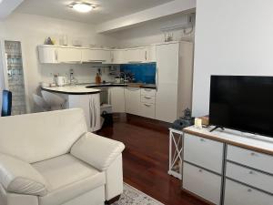 Kuchyň nebo kuchyňský kout v ubytování Villa de Blue