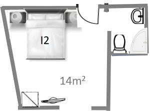 a floor plan of a bathroom with a toilet at Marousos Central Guesthouse in Portaria