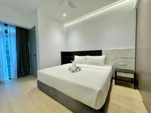 Foto Kuala Lumpuris asuva majutusasutuse 伊顿Eaton Residences 双子塔旁 无边银河泳池 五星民宿 坐揽无敌夜景 便捷行李寄存 galeriist