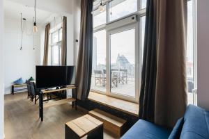 Staycity Aparthotels Leipzig City Centre的电视和/或娱乐中心