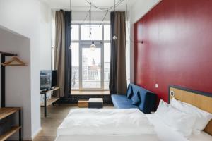 Staycity Aparthotels Leipzig City Centre客房内的一张或多张床位