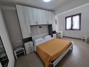 Postel nebo postele na pokoji v ubytování Villaggio Camping Lungomare