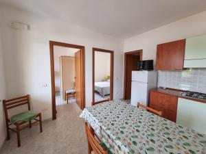 Postel nebo postele na pokoji v ubytování Villaggio Camping Lungomare