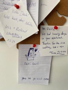 a pile of papers with writing on them at Apartment Centar Višnjik, Zadar in Zadar