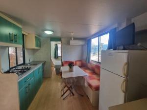 Kuchyň nebo kuchyňský kout v ubytování Villaggio Camping Lungomare