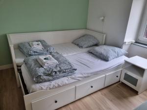 Postel nebo postele na pokoji v ubytování Le Tournesol, Appartement T1 bis