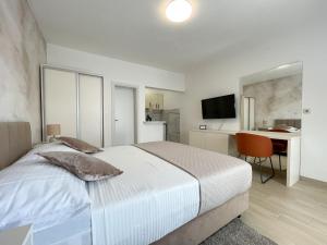 Łóżko lub łóżka w pokoju w obiekcie Apartments Marija Magdalena