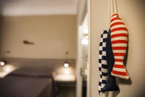an american flag sock hanging on a wall in a room at Salamureci Camere in Trapani