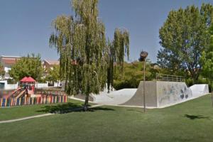 a skate park with a skateboard ramp in a park at Eixo Atlântico in Bragança