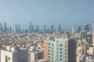 una vista aerea di una città con edifici alti di Era View Bahrain Luxurious 1 bedroom, Sea view and waterfront a Manama