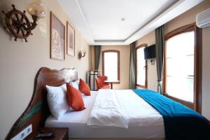 En eller flere senge i et værelse på CastaDiva