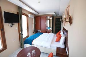 En eller flere senge i et værelse på CastaDiva