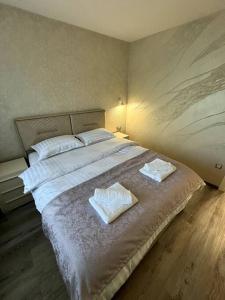 เตียงในห้องที่ Villa Moste 1 - Freeparking&pool