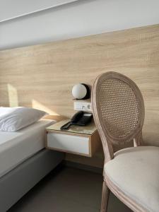 Posteľ alebo postele v izbe v ubytovaní Catherine Hotel
