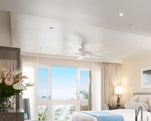 Postel nebo postele na pokoji v ubytování BodyHoliday St Lucia