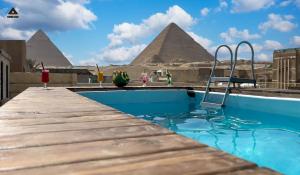 Bassein majutusasutuses Pyramids Height Hotel & Pyramids Master Scene Rooftop või selle lähedal