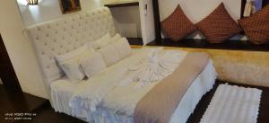 Säng eller sängar i ett rum på Clear View Resort