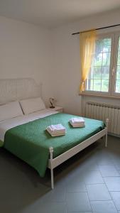 A bed or beds in a room at Rocca di Luna a Gemmano
