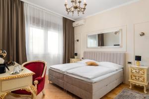 Postel nebo postele na pokoji v ubytování Storge Boutique Bed & Breakfast