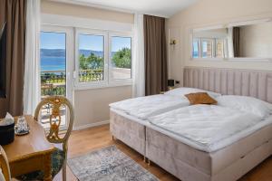 Postel nebo postele na pokoji v ubytování Storge Boutique Bed & Breakfast