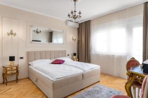 Postel nebo postele na pokoji v ubytování Storge Boutique Bed & Breakfast