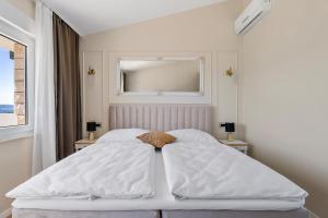 Postel nebo postele na pokoji v ubytování Storge Boutique Bed & Breakfast