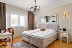 Postel nebo postele na pokoji v ubytování Storge Boutique Bed & Breakfast