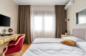 Postel nebo postele na pokoji v ubytování Storge Boutique Bed & Breakfast