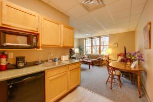 a kitchen with a sink and a table in a room at New Kensington Vacation Rental with Shared Amenities in New Kensington