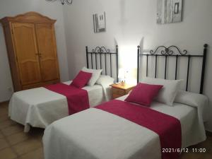 Cama o camas de una habitación en Apartmentos Corona