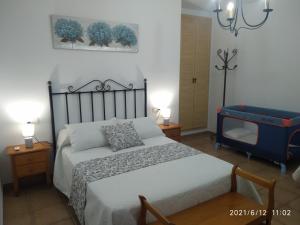 Cama o camas de una habitación en Apartmentos Corona