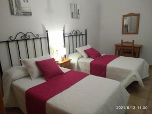 Cama o camas de una habitación en Apartmentos Corona