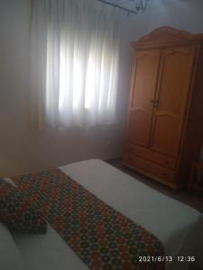 Cama o camas de una habitación en Apartmentos Corona