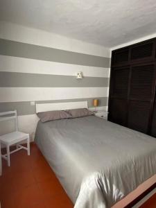 Llit o llits en una habitació de Praia do Carvoeiro, Quinta do Paraíso