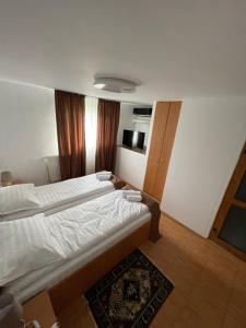 Postel nebo postele na pokoji v ubytování Vis de VARA