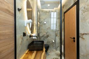 Koupelna v ubytování Hotel Joni