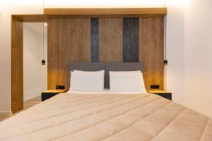 Postel nebo postele na pokoji v ubytování Hotel Joni