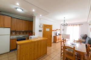 Una cocina o zona de cocina en Apartmentos Corona