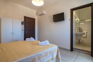 Letto o letti in una camera di HORIZON