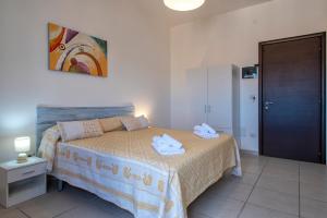 Letto o letti in una camera di HORIZON