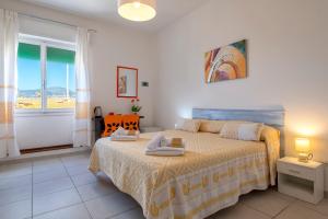 Letto o letti in una camera di HORIZON