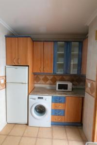 Una cocina o zona de cocina en Apartmentos Corona