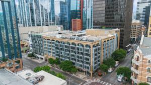 an aerial view of a city with tall buildings at Littlefield Lofts, Hosted by Placemakr in Austin