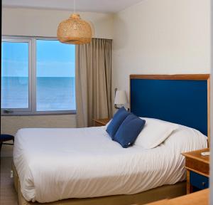 Cama ou camas em um quarto em ZAG Coliving Punta del este
