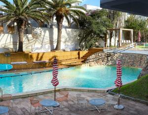 A piscina localizada em ZAG Coliving Punta del este ou nos arredores