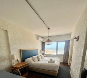 Cama ou camas em um quarto em ZAG Coliving Punta del este