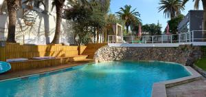A piscina localizada em ZAG Coliving Punta del este ou nos arredores
