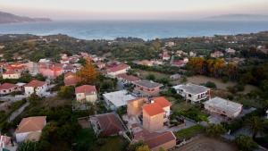 an aerial view of a small town with houses and the ocean at Filippos Apartments "Room 6" in Spartià +9 photos
