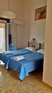 Postel nebo postele na pokoji v ubytování Filippos Apartments "Room 6" No kitchen